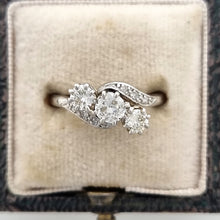 Load image into Gallery viewer, Vintage Platinum Diamond Three Stone Crossover Ring, 0.70ct in box