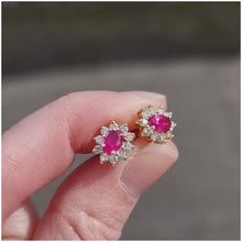 Load and play video in Gallery viewer, 18ct Gold Ruby & Diamond Oval Cluster Stud Earrings, 0.60ct