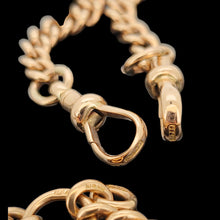 Load image into Gallery viewer, A close-up of a two rose gold lobster clasps with curb links
