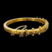 Load image into Gallery viewer, A yellow gold Etruscan style bangle bracelet set with emeralds and diamonds
