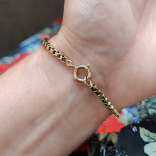 Load image into Gallery viewer, A yellow gold box link bracelet, modelled on a wrist
