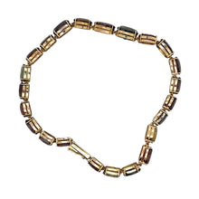 Load image into Gallery viewer, Vintage 9ct Gold Tourmaline, Garnet, Spinel, Iolite and Zircon Bracelet top down side view
