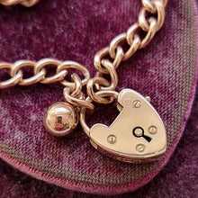 Load image into Gallery viewer, Edwardian 9ct Rose Gold Curb Link Bracelet with Heart Padlock &amp; Ball Charm close-up on padlock
