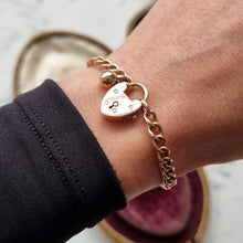 Load image into Gallery viewer, Edwardian 9ct Rose Gold Curb Link Bracelet with Heart Padlock &amp; Ball Charm modelled
