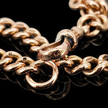 Load image into Gallery viewer, A rose gold curb link bracelet, on a black background
