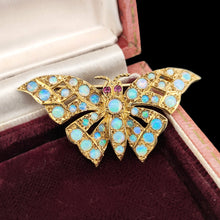 Load image into Gallery viewer, A yellow gold butterfly brooch with opals and ruby eyes, in an antique box
