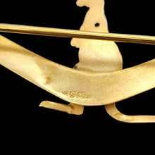 Load image into Gallery viewer, A close-up of an Australian 9 carat stamp on a yellow gold brooch, on a black background
