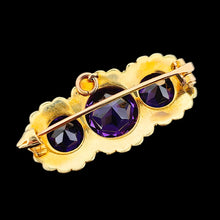 Load image into Gallery viewer, A yellow gold pearl and amethyst brooch, on a black background
