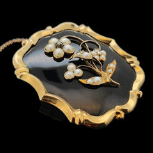 Load image into Gallery viewer, A black onyx, pearl and diamond flower brooch in yellow gold
