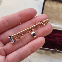 Load image into Gallery viewer, Antique 15ct Gold Lantern Lamp-post Sapphire Brooch in hand
