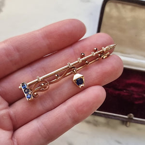 Antique 15ct Gold Lantern Lamp-post Sapphire Brooch in hand