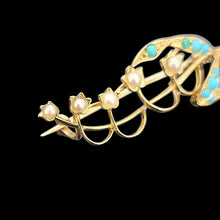 Load image into Gallery viewer, Gold brooch with pearls and turquoise stones on a black background
