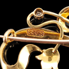 Load image into Gallery viewer, Close-up of a SS18 stamp on a yellow gold floral brooch
