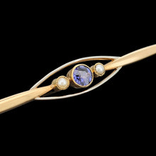 Load image into Gallery viewer, A yellow gold sapphire and pearl bar brooch, on a black background
