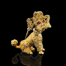 Load image into Gallery viewer, A yellow gold poodle dog brooch with ruby eyes and a diamond set collar, on a black background
