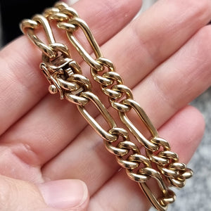 9ct Gold Heavy Figaro Link Chain, 58 grams in hand