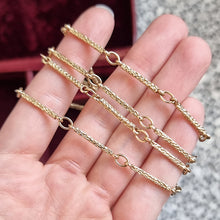 Load image into Gallery viewer, Vintage 9ct Gold 26.5&quot; Bark Effect Chain Necklace in hand
