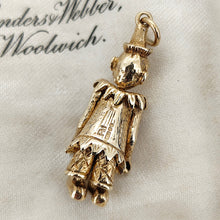 Load image into Gallery viewer, An articulated clown charm in yellow gold with coloured enamel buttons
