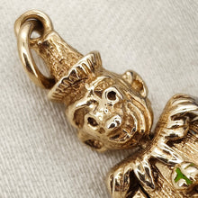 Load image into Gallery viewer, An articulated clown charm in yellow gold with coloured enamel buttons
