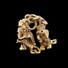 Load image into Gallery viewer, Three wise monkeys charm in yellow gold, on a black background
