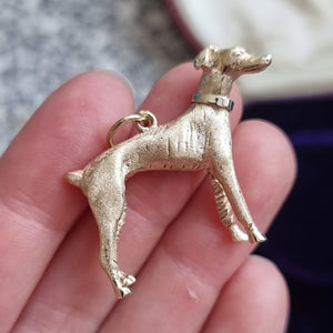 Vintage 9ct Gold Greyhound Dog Charm in hand