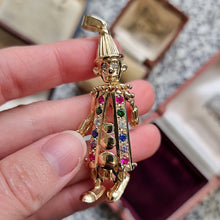 Load image into Gallery viewer, Vintage 9ct Gold Articulated Clown Pendant in hand
