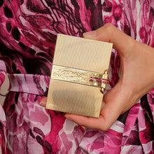 Load image into Gallery viewer, Art Deco 14k Yellow Gold Ruby Compact Case in hand
