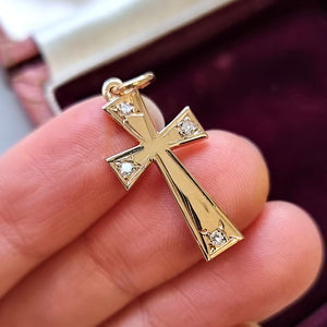 Vintage 9ct Gold Diamond Cross Pendant in hand