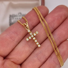 Load image into Gallery viewer, 18ct Yellow Gold Brilliant Cut Diamond Cross Pendant in hand, with chain
