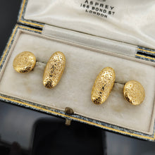 Load image into Gallery viewer, A pair of yellow gold engraved oval and round cufflinks, in an antique box

