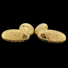 Load image into Gallery viewer, A pair of yellow gold engraved oval and round cufflinks, on a black background
