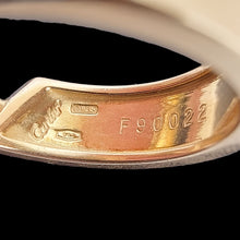 Load image into Gallery viewer, Close-up of a gold earring with visible Cartier branding and number &#39;F90022&#39;
