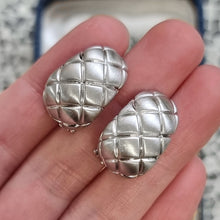 Load image into Gallery viewer, Vintage 9ct White Gold Quilted Half Hoop Earrings in hand
