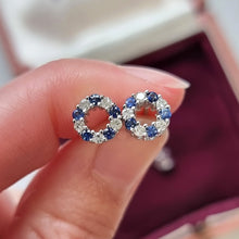 Load image into Gallery viewer, 18ct White Gold Sapphire and Diamond Circle Stud Earrings in hand
