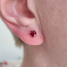 Load image into Gallery viewer, 18ct Yellow Gold Ruby Solitaire Stud Earrings modelled in ear
