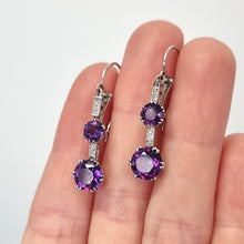 Load image into Gallery viewer, Vintage Platinum &amp; 18ct White Gold Amethyst and Diamond Drop Earrings in hand
