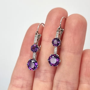 Vintage Platinum & 18ct White Gold Amethyst and Diamond Drop Earrings in hand