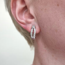 Load image into Gallery viewer, 18ct White Gold Brilliant Cut Diamond Oval Hoop Earrings modelled
