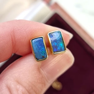 18ct Gold Black Opal Stud Earrings in hand