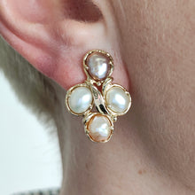 Load image into Gallery viewer, A pink and white pearl cluster earring in yellow gold, modelled in an ear
