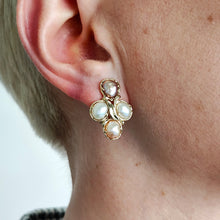 Load image into Gallery viewer, A pink and white pearl cluster earring in yellow gold, modelled in an ear
