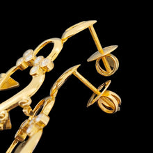 Load image into Gallery viewer, A pair of yellow gold open heart shaped drop earrings with diamonds, with screw posts and butterflies
