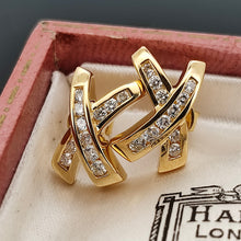 Load image into Gallery viewer, A pair of yellow gold round diamond cross shaped stud earrings, in an antique box
