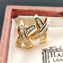 Load image into Gallery viewer, A pair of yellow gold round diamond cross shaped stud earrings, in an antique box
