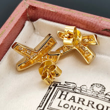 Load image into Gallery viewer, A pair of yellow gold round diamond cross shaped stud earrings, in an antique box
