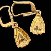 Load image into Gallery viewer, A pair of yellow and white gold diamond set drop earrings, on a black background
