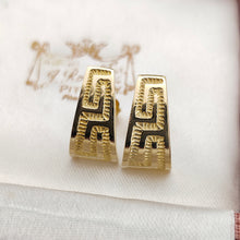 Load image into Gallery viewer, A pair of yellow gold Greek key design half hoop earrings, in an antique box
