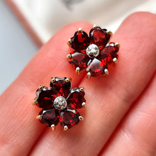 Load image into Gallery viewer, Vintage 9ct Gold Garnet and Diamond Cluster Stud Earrings in hand
