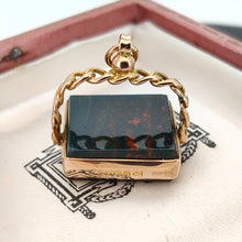 Load image into Gallery viewer, A bloodstone swivel fob in yellow gold, in an antique box
