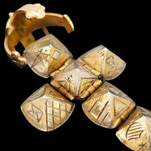 Load image into Gallery viewer, Gold and silver masonic cross pendant on a black background
